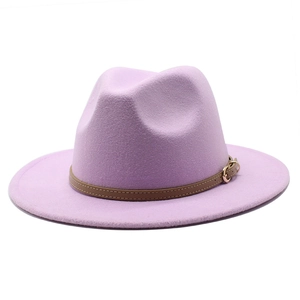 Close-up of lavender wool fedora hat featuring a brown leather band and gold metal buckle