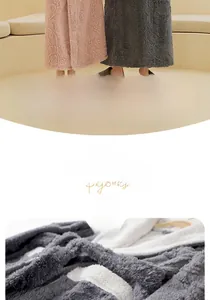 Close-up of double-layer thickened flannel bathrobe with embossed floral pattern detail