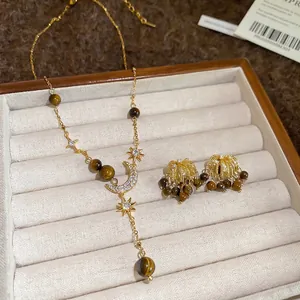 Zircon firework tiger eye stone jewelry set featuring moon and star tassel necklace earrings