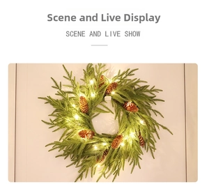 Close-up of pine needle Christmas wreath with warm LED lights and natural pine cones