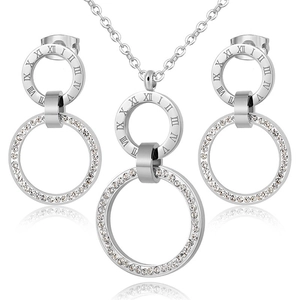 Detailed close-up of silver steel jewelry set with Roman numerals and pavé crystals