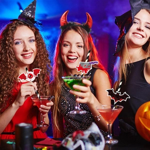 Halloween party set with devil horn headband and spooky bat eyeball straw decorations