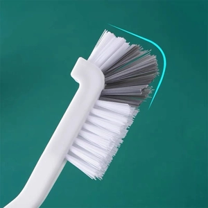 Long handle cup cleaning brush with grey and white curved bristles for deep scrubbing