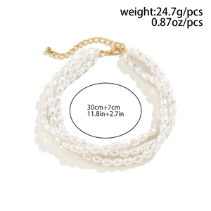 Detailed view of triple-layer pearl necklace with size and weight measurement data