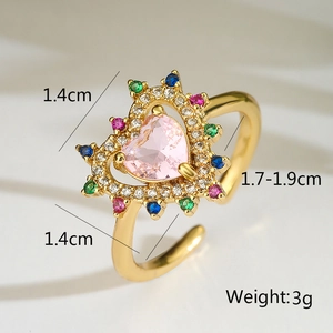 Macro view of 18K gold ring featuring heart-shaped pink zircon and colorful accents