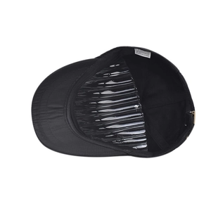 Close-up of the breathable 100% cotton inner lining and label on a black outdoor cap