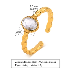 Detailed specs of gold twist ring with blue cubic zirconia and 8mm stone dimensions