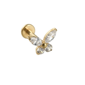 Piercing lèvre papillon doré avec ailes en zircon cubique sur fond blanc épuré