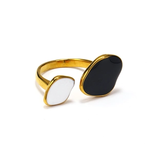 Detailed view of an irregular minimalist open ring with black and white enamel finish