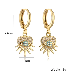 Detailed size view showing 2.6cm height and 1.1cm width of gold heart evil eye earrings