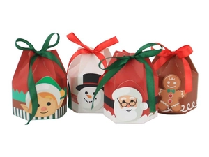 Group of Christmas yurt-shaped gift boxes with festive patterns and satin ribbons
