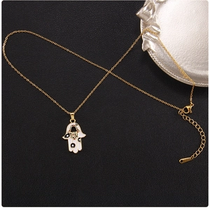 Detail of Hamsa Hand pendant with Evil Eye enamel and 45cm titanium steel chain