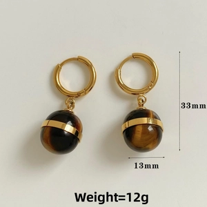 Detail showing 33mm tiger eye stone drop earrings with gold hoops and 13mm bead dimensions