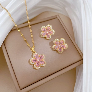 Luxurious titanium steel gold jewelry set with pink crystal flower necklace and earrings