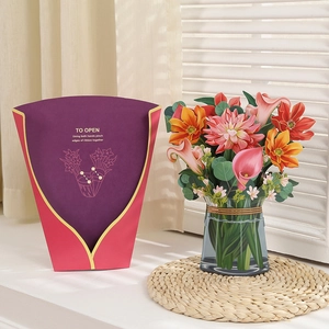 Detail view of 3D pop-up paper flower bouquet with purple packaging and usage instructions
