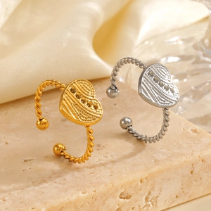 Golden and silver 18K gold plated heart rings with twisted rope texture band