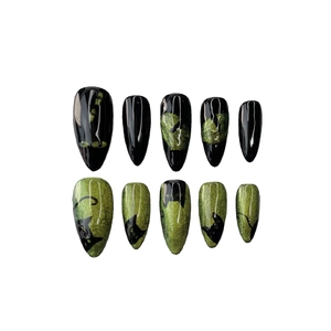 Handmade press-on nails with cat eye effect in black and olive green almond shape