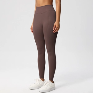 Detail of high-waist seamless yoga leggings with peach butt lifting effect and firm fit