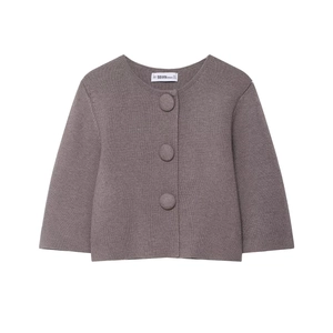 Elegant mauve round neck knit cardigan with large fabric-covered buttons in flat lay
