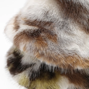 Faux fur camouflage bucket hat featuring thick plush texture in brown and grey tones
