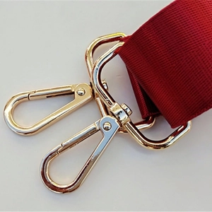 Adjustable burgundy nylon shoulder strap for men's bags with gold swivel lobster clasps