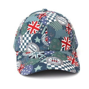 Detail of vintage Union Jack graffiti and royal crest embroidery on cotton baseball cap