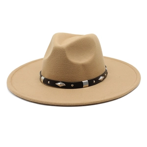 Detail of camel wool fedora hat featuring a black leather band with silver diamond studs