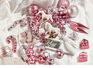 Detailed set of pink and white unicorn Christmas ornaments with festive glitter accents