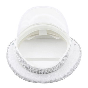 Detailed top view of white sequined captain hat with sparkling silver rhinestones
