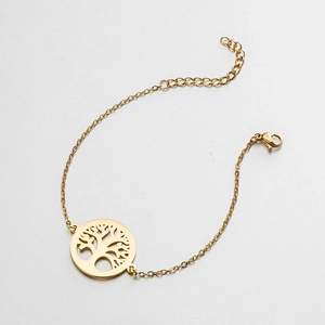 Detail showing gold Tree of Life charm on a dainty stainless steel chain with lobster clasp