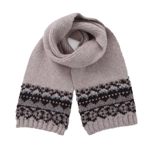 Detail of oatmeal knit scarf with Nordic geometric patterns and thick wool texture