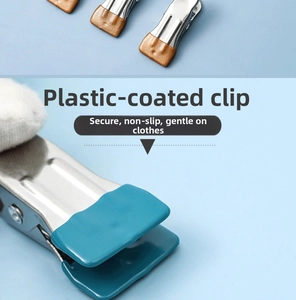 Detail of plastic-coated clip head for non-slip grip on stainless steel clothes pegs