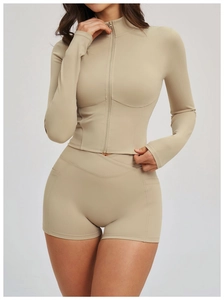 Detail of cross high waist shorts with side pocket and zip-up collar yoga jacket