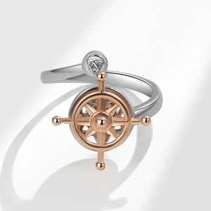 Anxiety rotating ship wheel ring in silver and rose gold finish for stress relief