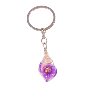 Creative glowing purple resin seashell keychain with natural shell detail on white background