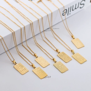 Detailed close-up of gold stainless steel rectangular zodiac tarot pendant necklaces