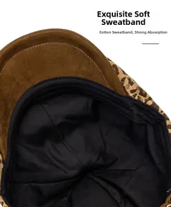 Detailed macro shot of the cotton sweatband and soft suede brim of the leopard print beret