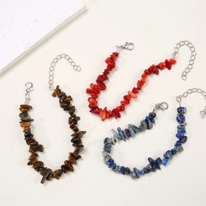 Close-up of natural colorful crushed stone bracelets with silver lobster clasps and chains