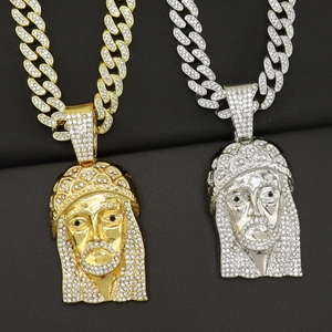 Hip hop style cuban necklaces in gold and silver with iced out Jesus head pendants