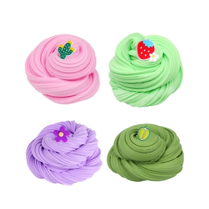 Set of four colorful scented butter slime jars with cute fruit and cactus charms