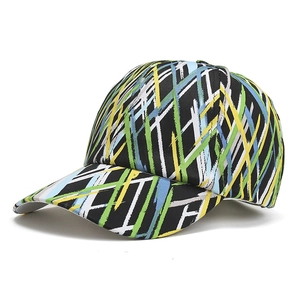 Street style baseball cap with colorful graffiti paint strokes on black canvas