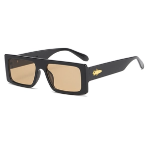 Chic oversized square sunglasses with black frames, brown lenses and gold bullet detail