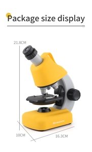 Detailed view of yellow children's microscope dimensions 21.8cm height with scale indicators