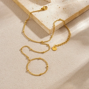 Minimalist gold-plated stainless steel slave bracelet with dainty beads and lobster clasp