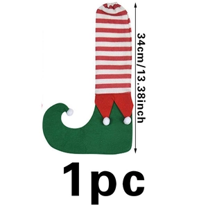Detail of Christmas elf shoe chair leg cover with red stripes and green felt, 34cm height