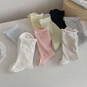 Pastel ribbed cotton crew socks for women in multiple colors with rolled edges