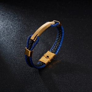 Bracelet pour homme en cuir tressé avec détails en acier inoxydable doré et fermoir magnétique