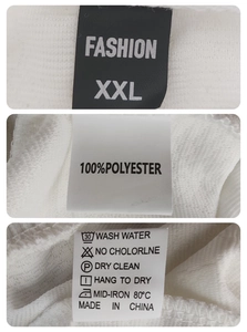 Detail view of garment care labels showing 100% polyester fabric and washing instructions
