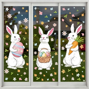 Easter window clings featuring bunnies with colorful eggs and flowers on glass doors