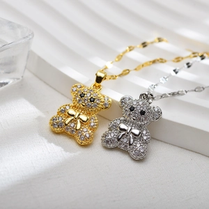 Elegant bear pendant necklace with sparkling zircon crystals in gold and silver finish